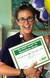 Pediatric nurse Bisceglia celebrates winning The DAISY Award in 2018.