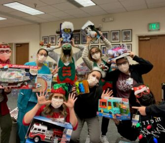 Child Life Services team and volunteers at Mary Bridge Children's Hospital hard at work in Santa's Workshop