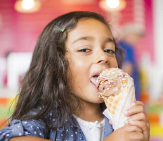 Girl eating ice cream.