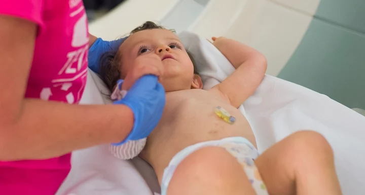 Infant preparing for an MRI scan.