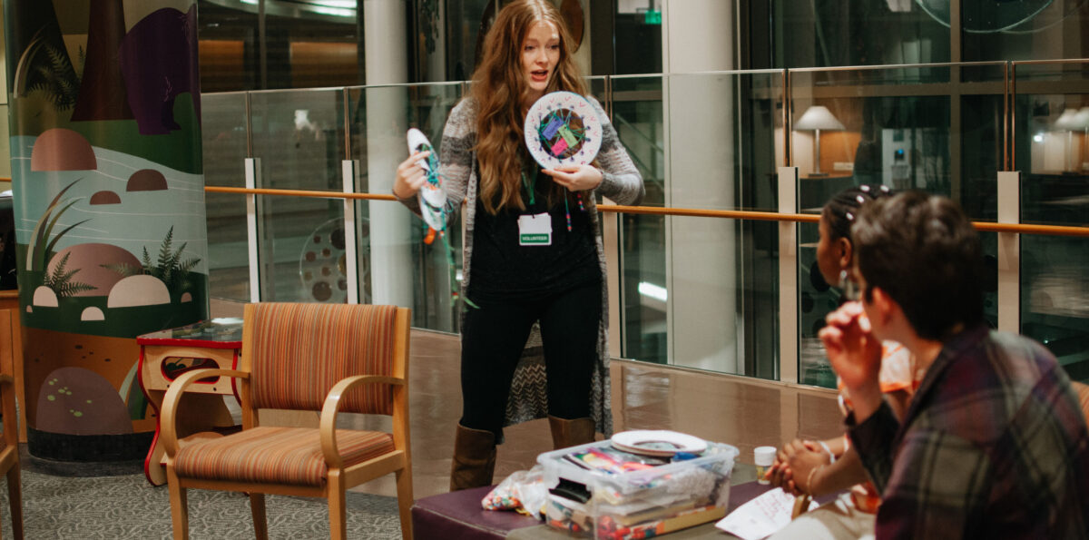 Volunteer at speaks during a session at Bridges Center for Grieving Children program.