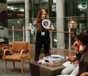 Volunteer at speaks during a session at Bridges Center for Grieving Children program.