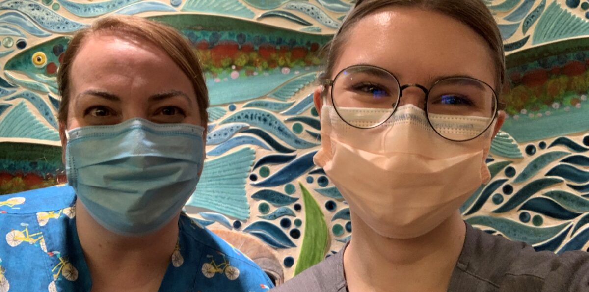 Nicole Geffrey, RN, and Emily posing for a picture together at Mary Bridge Children's Hospital.