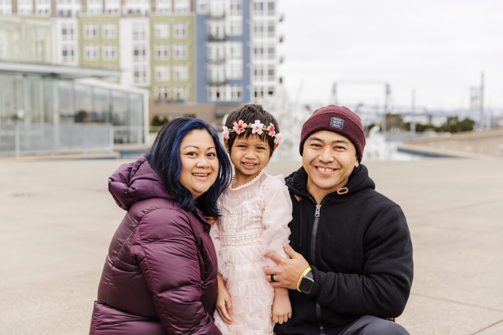 Family photo with Nohea with her parents, Aggie and Richard.