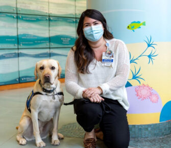 Mary Bridge Children's facility dog, Olaf and handler Kristen Bishop.