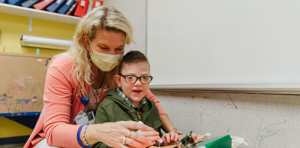 Ollie works on an art project with Mary Bridge Children’s Pediatric Intensive Care Unit (PICU) Nurse, Molly Olsen.