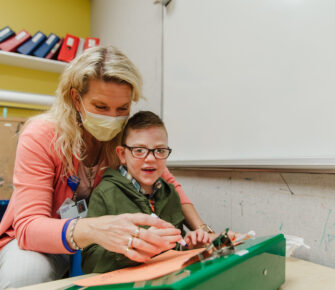 Ollie works on an art project with Mary Bridge Children’s Pediatric Intensive Care Unit (PICU) Nurse, Molly Olsen.