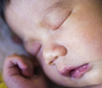 Close up of a sleeping baby.