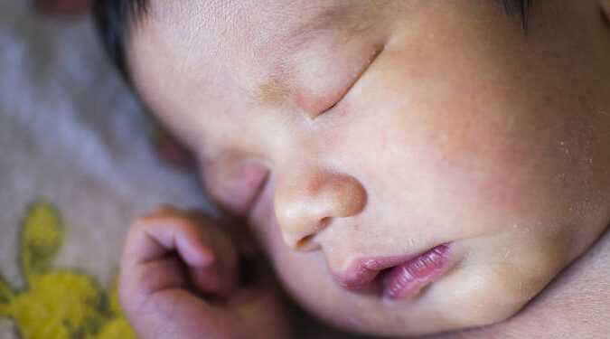 Close up of a sleeping baby.