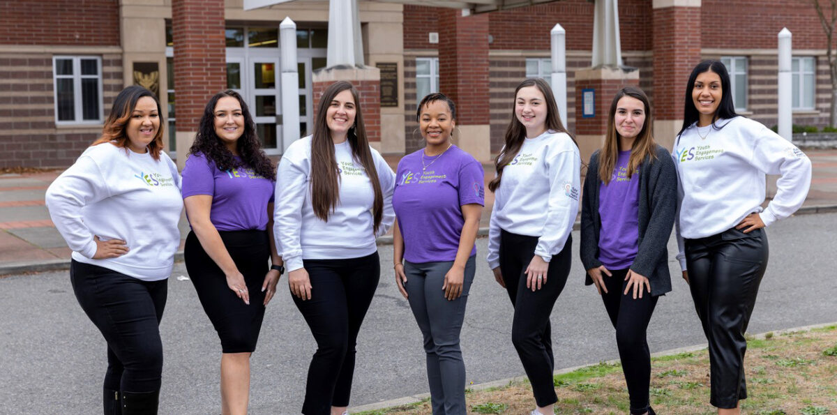 Members of KMHPC’s Youth Engagement Services (YES) team pose for a photo.